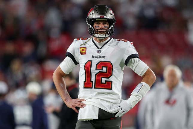 January 16, 2023;  Tampa, Florida, USA;  Tampa Bay Buccaneers quarterback Tom Brady (12) looks on before a wild card game against the Dallas Cowboys at Raymond James Stadium.