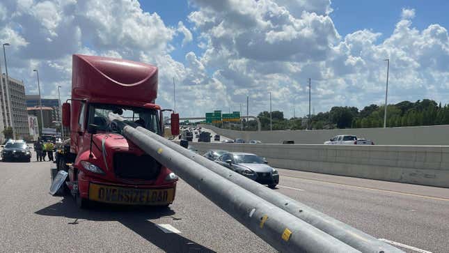 Image for article titled Truck Driver Somehow Survives Two 5,000-LB Poles Smashing Through His Windshield