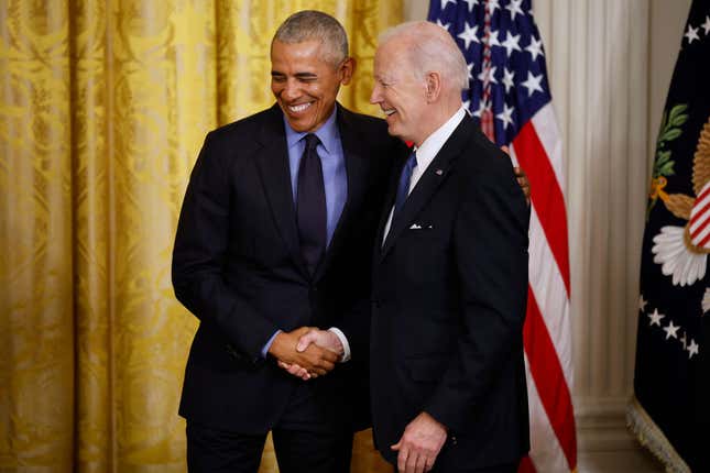Former President Barack Obama (L) and U.S. President Joe Biden shake hands during an event to mark the 2010 passage of the Affordable Care Act in the East Room of the White House on April 05, 2022, in Washington, DC.