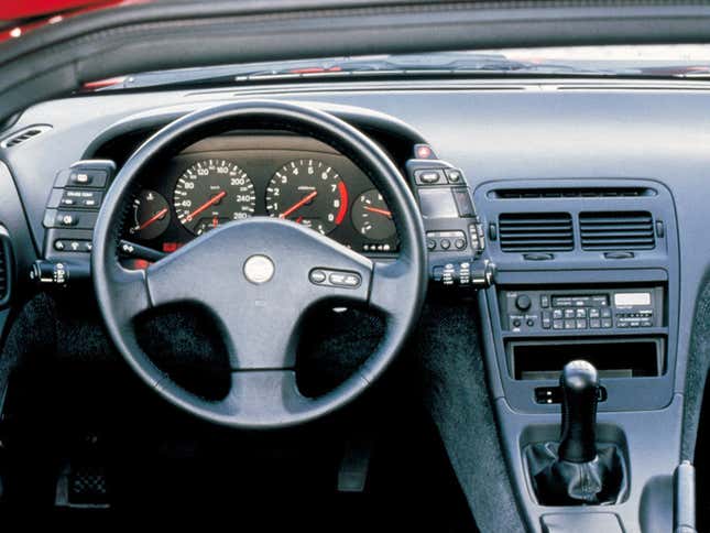 View of the driver-side dashboard and instrument cluster of a Z32 Nissan 300ZX.