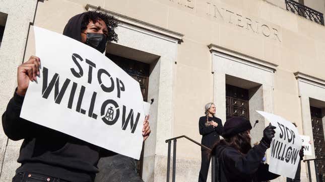 Activists protest outside the Interior Department in November. 