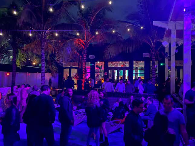 Revelers gather at a Miami tech happy hour on Nov. 24, 2021.
