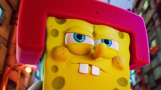 A close up image shows Spongebob in a red foam hat with a mean look on his face. 