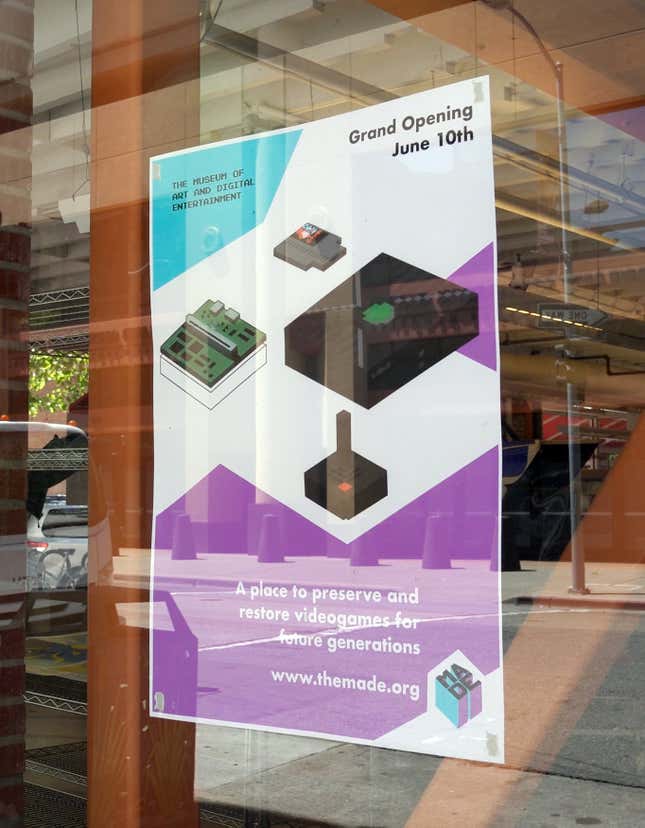 A poster in the window of The MADE's new location advertises its forthcoming June 10 grand re-opening.