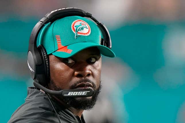 Miami Dolphins head coach Brian Flores during the second half of an NFL football game against the New England Patriots, Sunday, Jan. 9, 2022, in Miami Gardens, Fla. Fired Miami Dolphins Coach Brian Flores sued the NFL and three of its teams Tuesday, Feb. 1, 2022 saying racist hiring practices by the league have left it racially segregated and managed like a plantation.