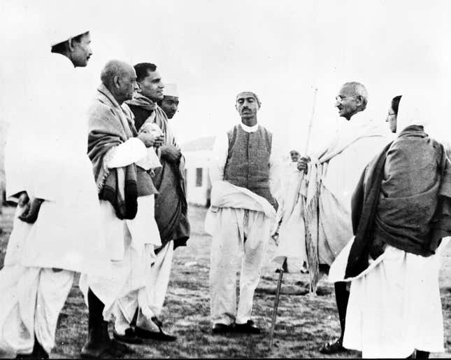 Gandhi often spoke with industrialists, such as Jagal Kishore Birla (far left) of the Birla Group.