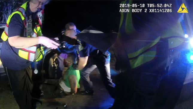 This image from video from Louisiana state trooper Lt. John Clary’s body-worn camera shows troopers and medical personnel with Ronald Greene on May 10, 2019, outside of Monroe, La. 

