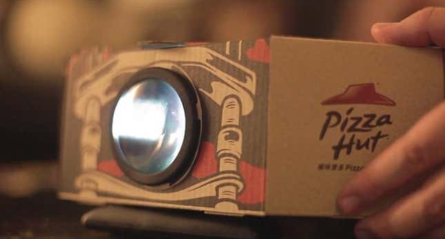 Image for article titled Pizza Hut has made the pizza box movie projector we’ve always dreamed of