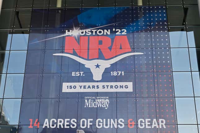 The George R. Brown convention center in downtown Houston, Texas with the NRA decoration advertising 14 acres of guns and gear for the ‘22 National Rifle Association convention.