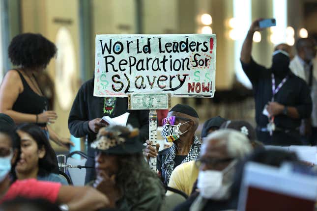 Los Angeles, CaliforniaSept. 22, 2022Los Angeles long-time resident, Walter Foster, age 80, holds up a sign as the Reparations Task Force meets to hear public input on reparations at the California Science Center in Los Angeles on Sept. 22, 2022