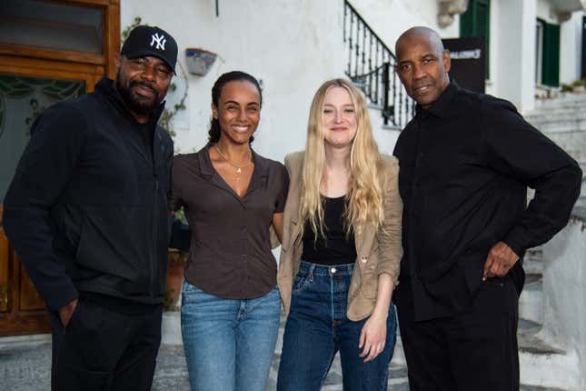 Antoine Fuqua, Gaia Scodellaro, Dakota Fanning and Denzel Washington attends “The Equalizer 3&quot; photocall on October 19, 2022 in Atrani, Amalfi, Italy.