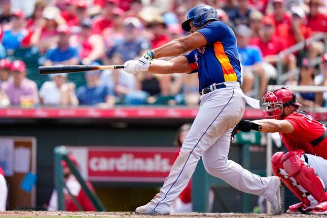 Mar 16, 2023; Jupiter, Florida, USA; Houston Astros first baseman Jose Abreu (79) hits a home run against the St. Louis Cardinals during the fourth inning at Roger Dean Stadium.