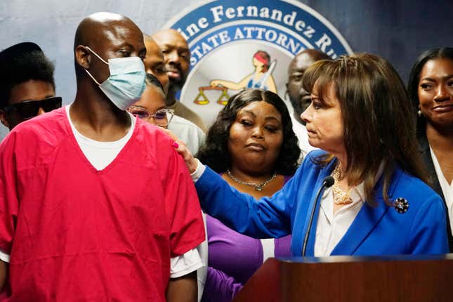 State Attorney Katherine Fernandez Rundle looks at Thomas “Jay” Raynard James after announcing a motion to vacate his 1991 murder conviction, Wednesday, April 27, 2022, in Miami. A judge vacated the life sentence of James who prosecutors said was wrongfully convicted because of mistaken identity.
