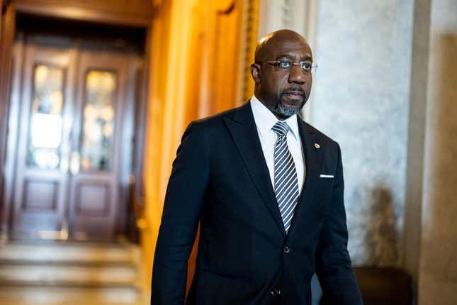 Sen. Raphael Warnock (D-GA) walks out of the Senate Chambers during a series of votes in the U.S. Capitol Building on May 11, 2022, in Washington, DC.