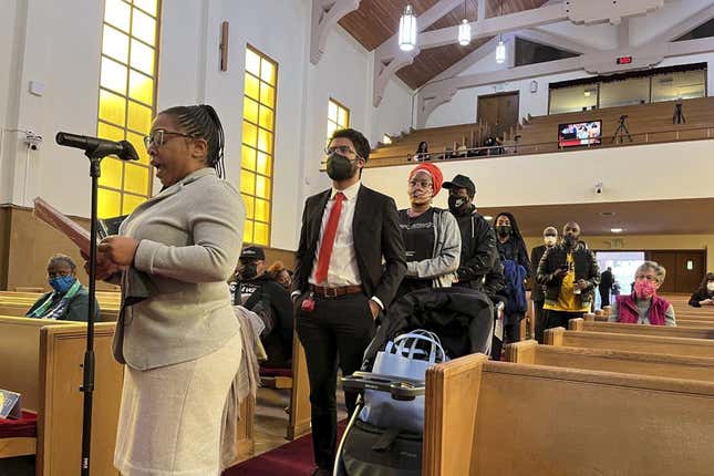 People line up to speak during a reparations task force meeting at Third Baptist Church in San Francisco on April 13, 2022. A report by California’s first in the nation task force on reparations Wednesday, June 1, will document in detail the harms perpetrated by the state against Black people and recommend ways to address those wrongs. 