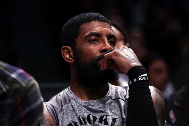NEW YORK, NEW YORK - NOVEMBER 01: Kyrie Irving #11 of the Brooklyn Nets looks on from the bench during the second quarter of the game against the Chicago Bulls at Barclays Center on November 01, 2022, in New York City. 