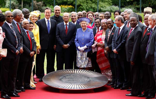 Britain's Queen Elizabeth II poses for photographs with heads of government and representatives of Commonwealth nations in London on June 6, 2012.
