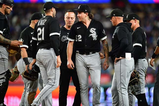Jun 14, 2023; Los Angeles, California, USA; Chicago White Sox starting pitcher Mike Clevinger (52) reacts after suffering an apparent injury against the Los Angeles Dodgers/ during the fifth inning at Dodger Stadium.