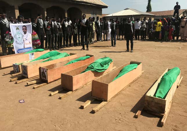 Members of the Islamic Movement of Nigeria pray near the bodies of its members, who were killed after security forces opened fire during the Shi’ite group’s protests, in Mararaba, near Abuja, Nigeria Nov. 8, 2018.