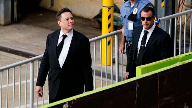 File photo of Elon Musk walking from the the justice center in Wilmington, Del., on July 12, 2021.