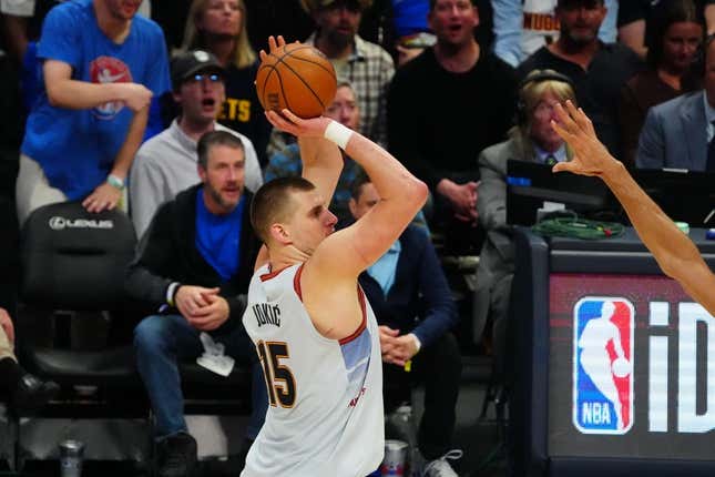 Apr 25, 2023; Denver, Colorado, USA; Denver Nuggets center Nikola Jokic (15) shoots in the second half against the Minnesota Timberwolves in game five of the 2023 NBA Playoffs at Ball Arena.