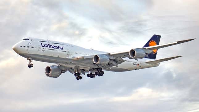 A Boeing 747 with while Lufthansa airlines livery.