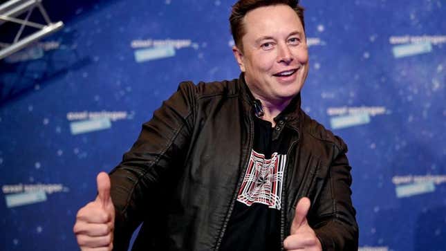 Musk giving a double-thumbs-up.