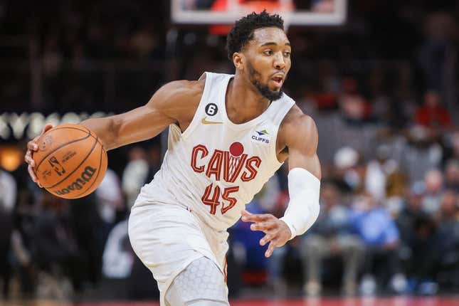 Feb 24, 2023; Atlanta, Georgia, USA; Cleveland Cavaliers guard Donovan Mitchell (45) dribbles against the Atlanta Hawks in the first quarter at State Farm Arena.