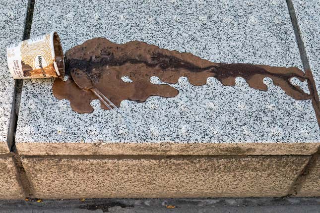 An abandoned and melting pint of ice cream drys along a city street on June 27, 2021 in Portland, Oregon. 