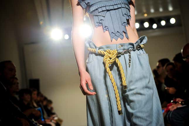 A model wears a creation by Belgian fashion designer Veronique Branquinho for her Spring/Summer 2015 ready-to-wear fashion collection presented in Paris, France, Monday, Sept. 29, 2014. (AP Photo/Zacharie Scheurer)