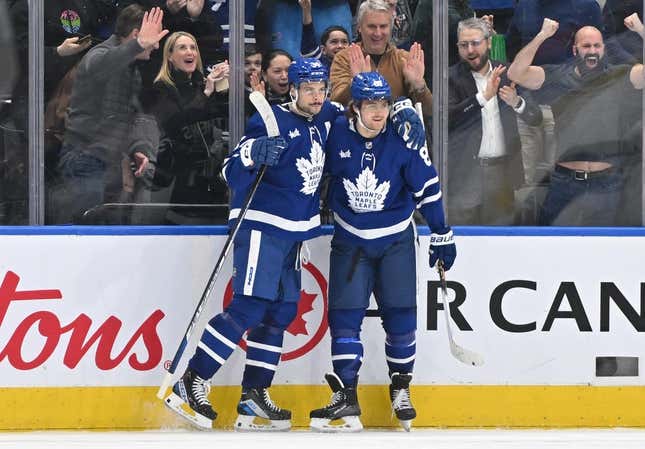 Feb 24, 2023; Toronto, Ontario, CAN;   Toronto Maple Leafs forward William Nylander (88) celebrates with forward Auston Matthews (34) after scoring the winning goal in overtime against the Minnesota Wild at Scotiabank Arena.