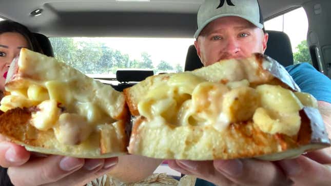 Man holding Mac and Cheese Sandwich up to camera