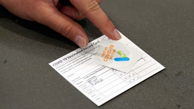 Someone showing a vaccination card at the Banning Recreation Center in Wilmington, California. 
