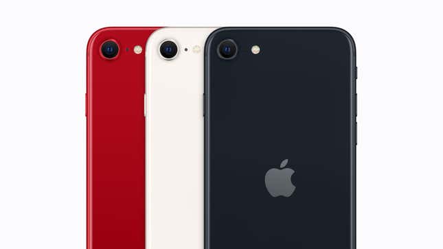 Three iPhone SE phones in red, white and black with the Apple logo.