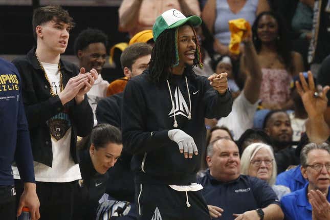 Apr 19, 2023; Memphis, Tennessee, USA; Memphis Grizzlies guard Ja Morant (12) gives direction from the bench during the first half during game two of the 2023 NBA playoffs against the Los Angeles Lakers at FedExForum.