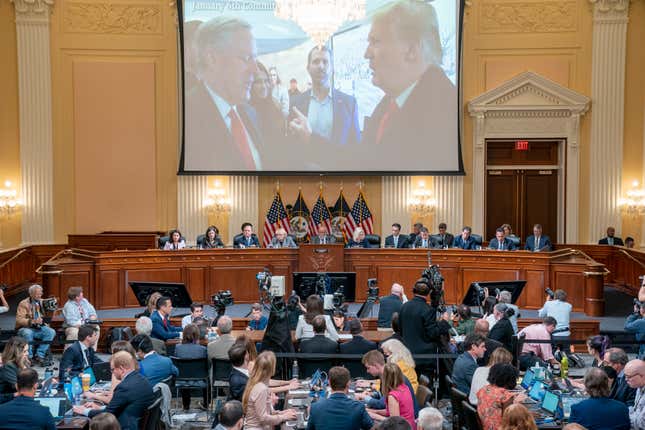 A image of former President Donald Trump talking to his chief of staff Mark Meadows is seen as Cassidy Hutchinson, former aide to Trump White House chief of staff Mark Meadows, testifies as the House select committee investigating the Jan. 6 attack on the U.S. Capitol holds a hearing at the Capitol in Washington, June 28, 2022.
