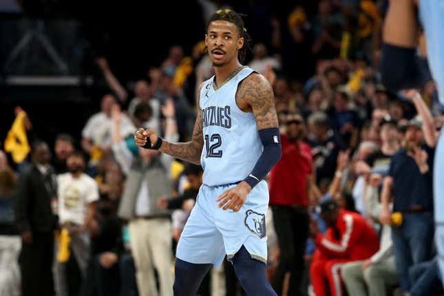 April 26, 2023;  Memphis, Tennessee, USA;  Memphis Grizzlies guard Ja Morant (12) reacts during the second half against the Los Angeles Lakers during game five of the 2023 NBA playoffs at FedExForum.