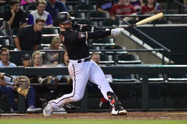 May 8, 2023; Phoenix, Arizona, USA; Arizona Diamondbacks first baseman Christian Walker (53) hits a solo home run in the sixth inning against the Miami Marlins at Chase Field.