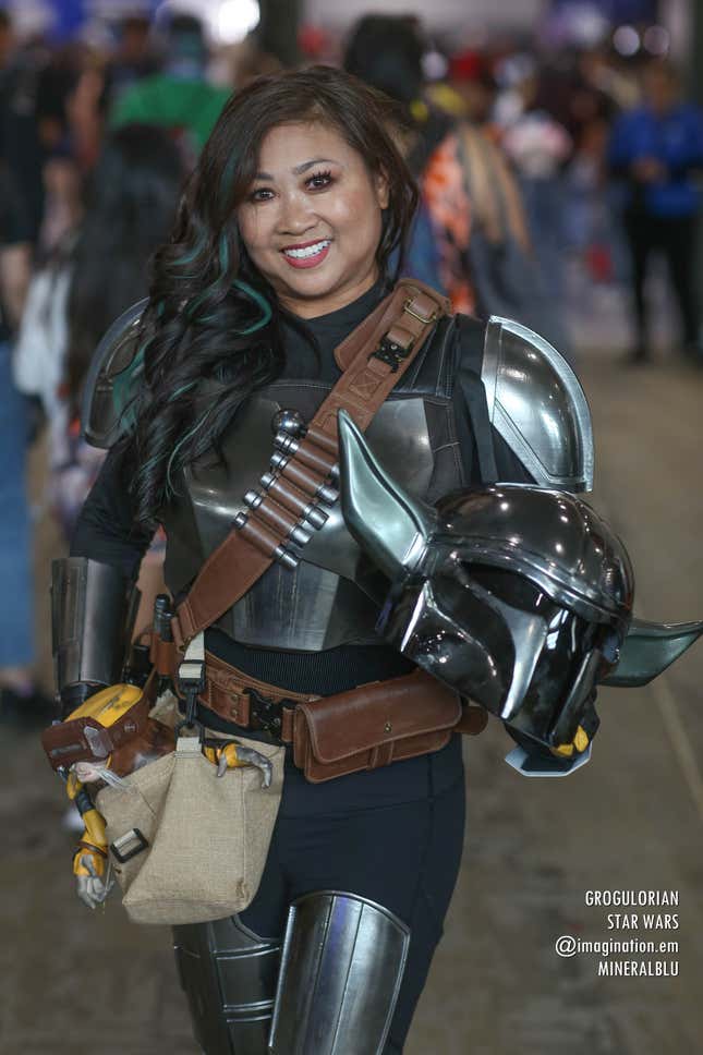A cosplay that combines Grogu and The Mandalorian from the hit Disney Plus series, with the helmet featuring Grogu ears.