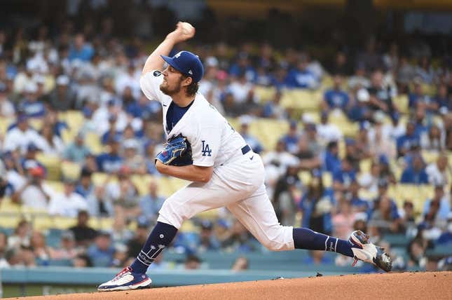 Jun 28, 2021; Los Angeles, California, USA;  Los Angeles Dodgers starting pitcher Trevor Bauer (27) pitches against the San Francisco Giants in the first inning at Dodger Stadium.