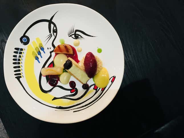 Les Créatifs - Vanilla custard mousse in a lemon wafer sable with berry sorbet and poached pear