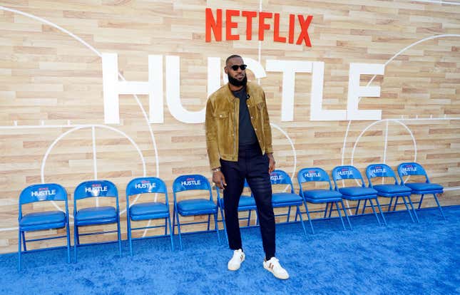 NBA basketball player LeBron James, a producer of the Netflix film “Hustle,” poses at the premiere of the film, Wednesday, June 1, 2022, at the Regency Village Theatre in Los Angeles.