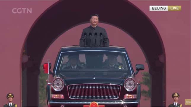 Chinese leader Xi Jinping rolling out to review the troops. 