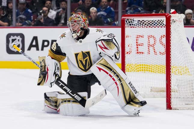 Mar 21, 2023; Vancouver, British Columbia, CAN; Vegas Golden Knights goaltender Jonathan Quick (32) makes a save against the Vancouver Canucks in the third period at Rogers Arena.