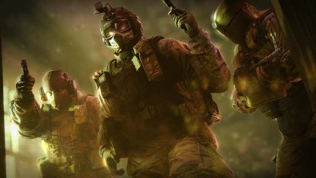 A screenshot from Rainbow Six Siege shows three armed soldiers inside a dark building.