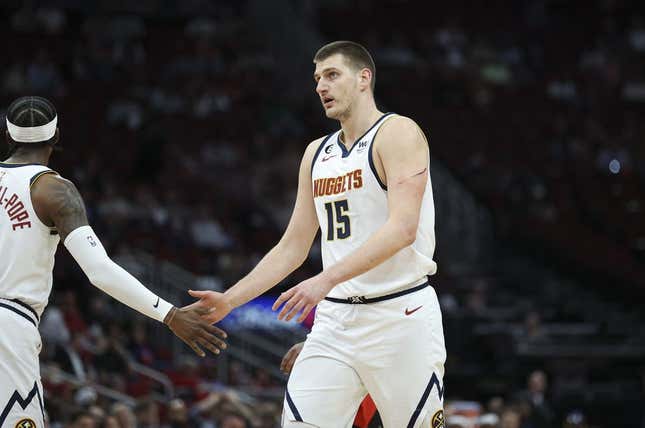Feb 28, 2023; Houston, Texas, USA; Denver Nuggets center Nikola Jokic (15) reacts after a play during the first quarter against the Houston Rockets at Toyota Center.