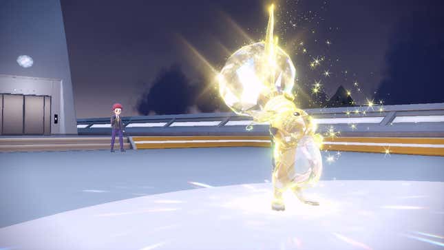 A Raichu is seen celebrating a victory with a lightbulb tera crystal on its head. Its trainer is in the background cheering it on.
