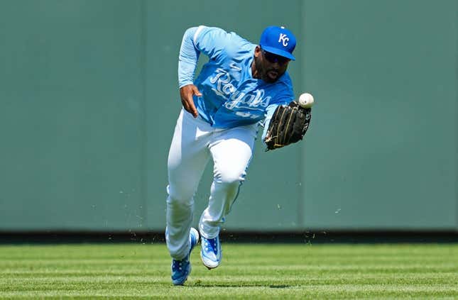 May 28, 2023; Kansas City, Missouri, USA; Kansas City Royals right fielder Jackie Bradley Jr. (41) is unable to make the catch during the eighth inning against the Washington Nationals at Kauffman Stadium.