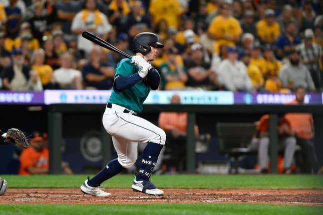 Aug 12, 2023; Seattle, Washington, USA; Seattle Mariners left fielder Cade Marlowe (18) hits a single against the Baltimore Orioles during the ninth inning at T-Mobile Park.