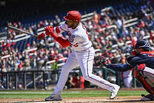 Apr 2, 2023; Washington, District of Columbia, USA; Washington Nationals first baseman Dominic Smith (22) hits an RBI single against the Atlanta Braves during the first inning at Nationals Park.